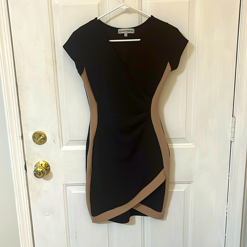 Black and tan bodycon dress.  Size M. Very flattering . Great for a night out.